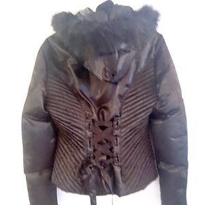 Very nice Bebe jacket with faux trimmed removable hood. Unique cinch up back.